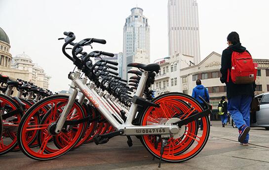 上海热线财经频道--摩拜发布共享单车停放倡议